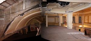 A partial panorama showing the mezzanine, with elevator damage to the ceiling on the left and portions of the lobby on the right. - , Utah